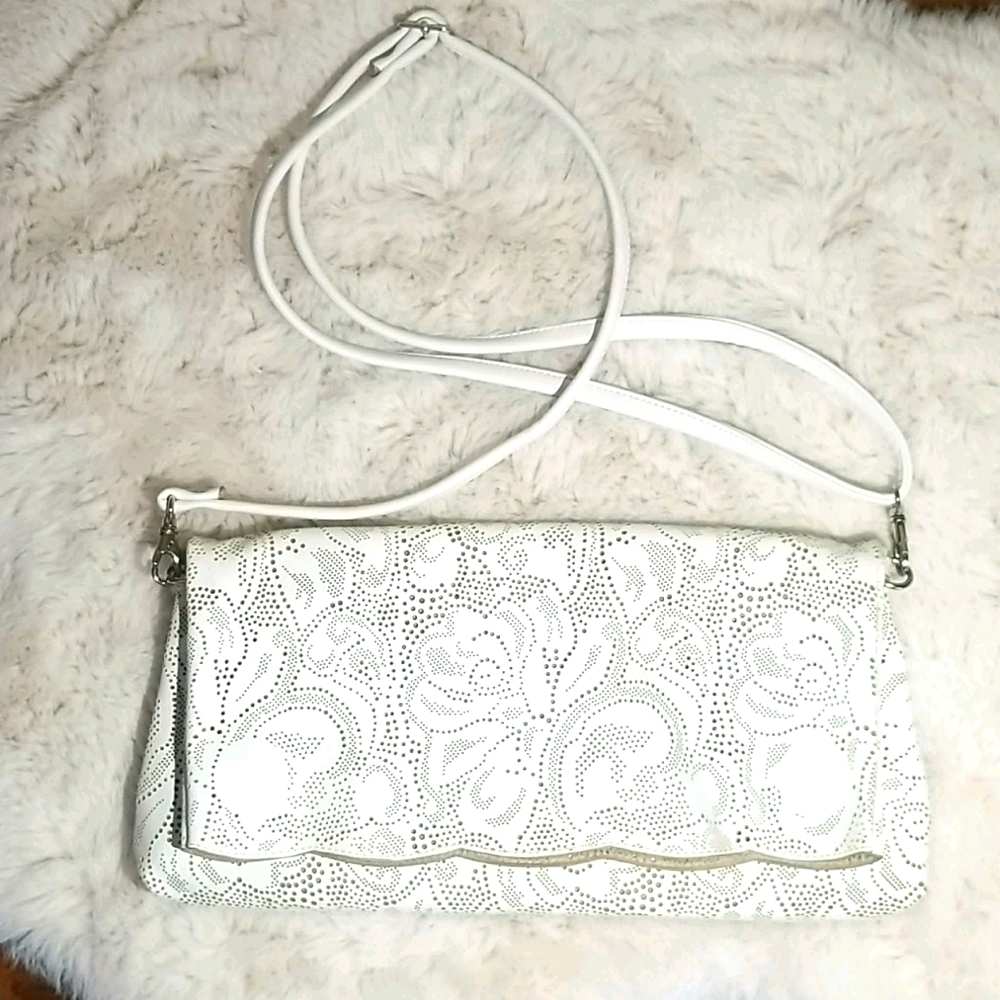 Buco laser cut white purse/clutch